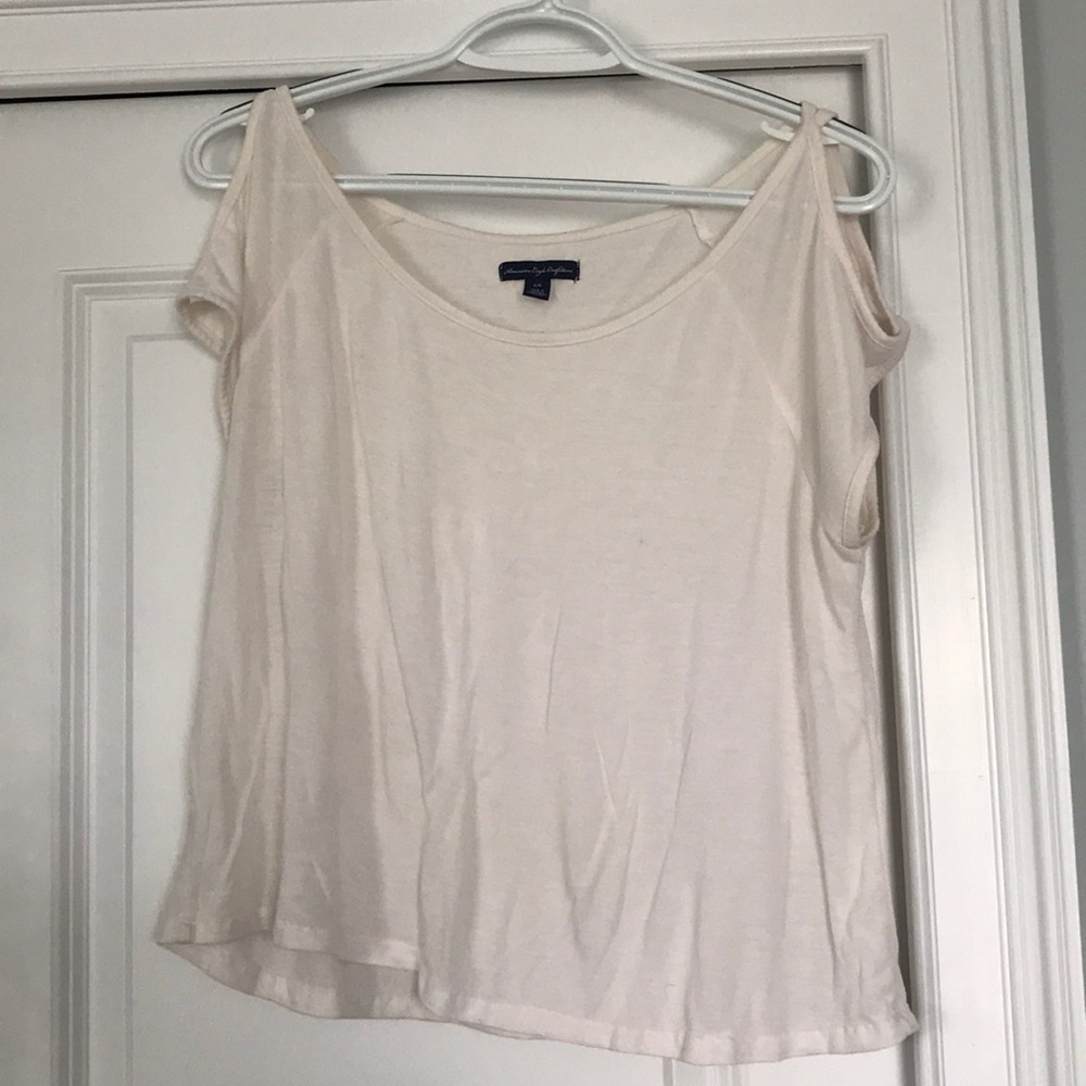Peekaboo shoulder white crop top
